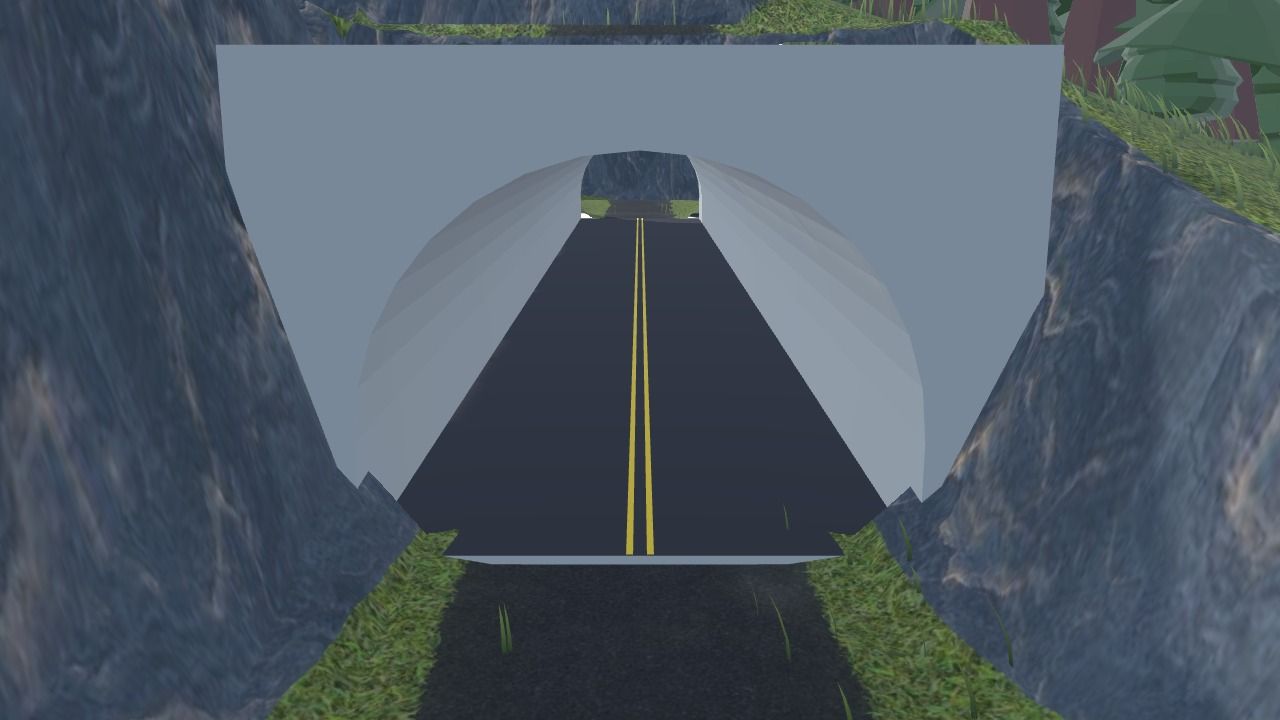 The entrance of a tunnel, through a hole in the face of a hill